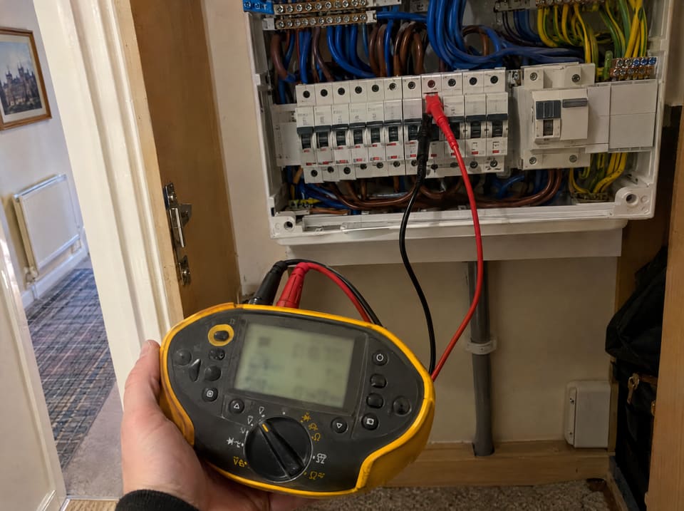 Testing circuits at a consumer unit during an EICR